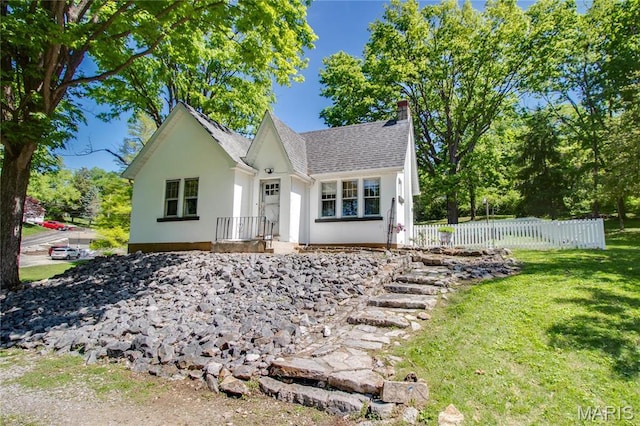 931 Sugarloaf Hill Rd, Dupo, IL 62239 - view of front of home with a chimney, roof with shingles, and stucco siding