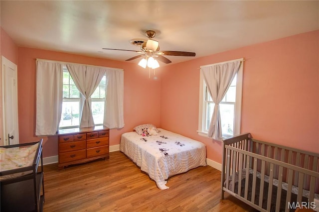 931 Sugarloaf Hill Rd, Dupo, IL 62239 - bedroom featuring wood finished floors, baseboards, and ceiling fan