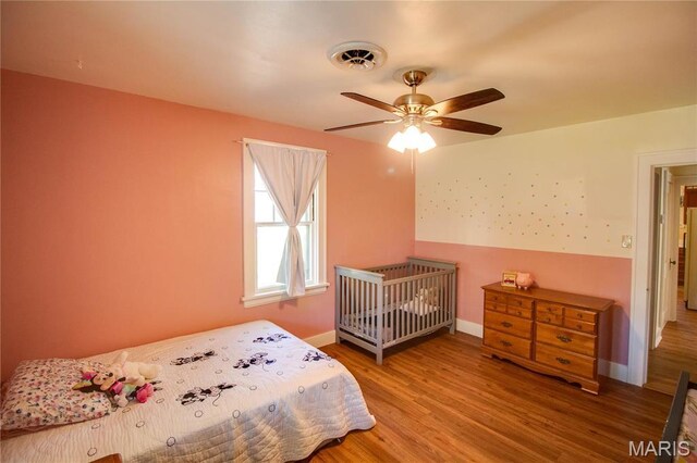 931 Sugarloaf Hill Rd, Dupo, IL 62239 - bedroom with wood finished floors, baseboards, and a ceiling fan