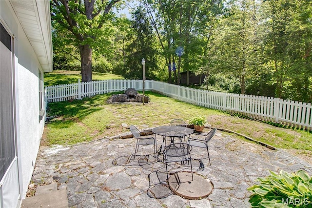 931 Sugarloaf Hill Rd, Dupo, IL 62239 - view of patio / terrace with outdoor dining area and view of wooded area