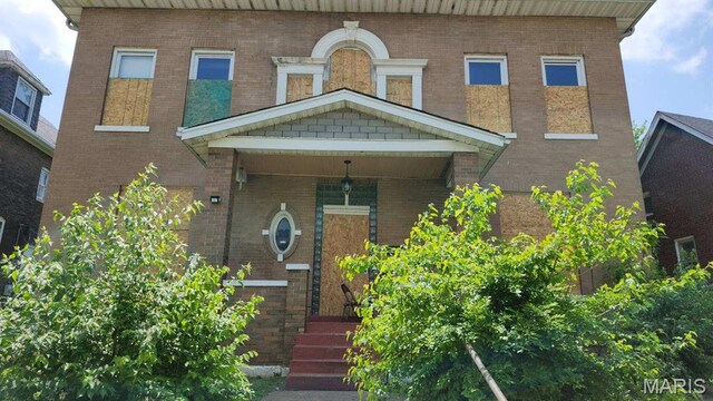 26 Lewis Pl, Saint Louis, MO 63113 - view of front facade featuring brick siding