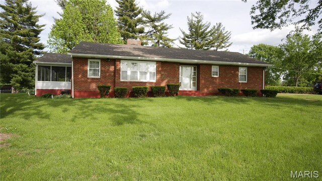 209 Highley Ln, Desloge, MO 63628 - single story home with a chimney, a front lawn, a sunroom, and brick siding