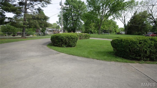 209 Highley Ln, Desloge, MO 63628 - view of home's community with a lawn and driveway