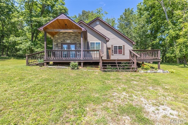 249 Trails End Way, Doniphan, MO 63935 - back of property featuring stone siding, a wooden deck, a yard, and french doors