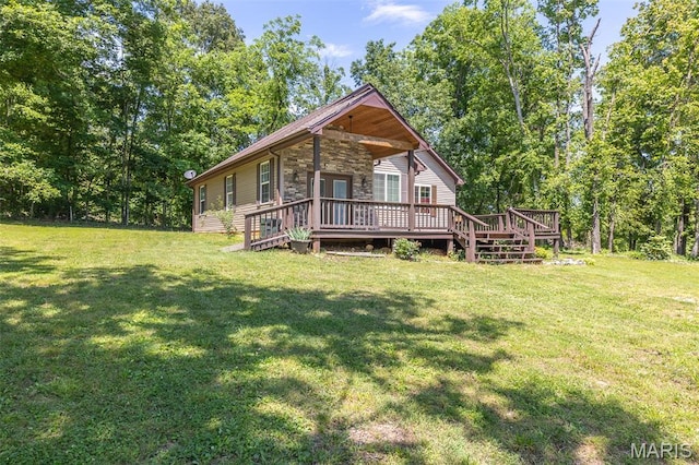 249 Trails End Way, Doniphan, MO 63935 - view of front of property with stone siding, a wooden deck, and a front lawn