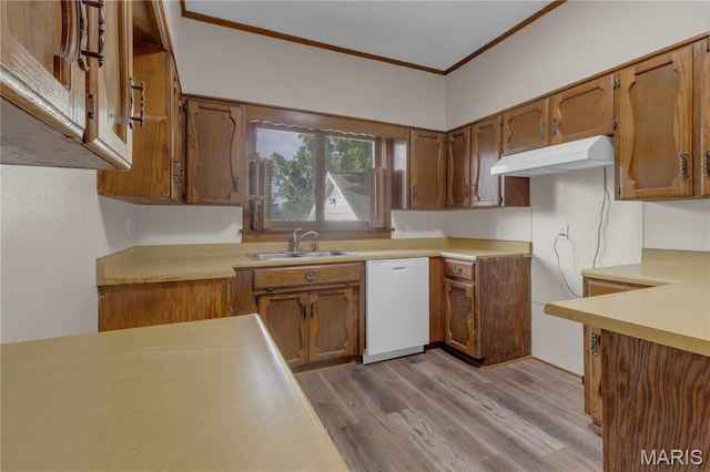 317 S Louisiana St, Cape Girardeau, MO 63703 - kitchen with white dishwasher, under cabinet range hood, a sink, crown molding, and brown cabinetry