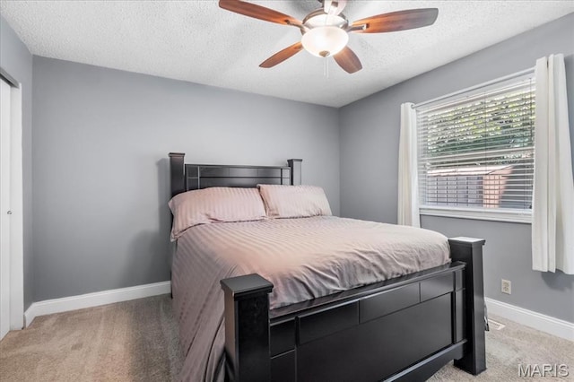 1748 Scenic Meadows Dr, Imperial, MO 63052 - bedroom featuring light colored carpet, a textured ceiling, baseboards, and ceiling fan