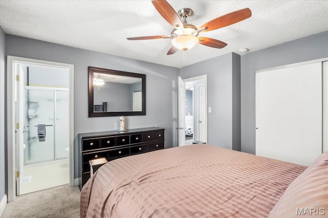 1748 Scenic Meadows Dr, Imperial, MO 63052 - carpeted bedroom featuring ensuite bathroom, ceiling fan, and a textured ceiling