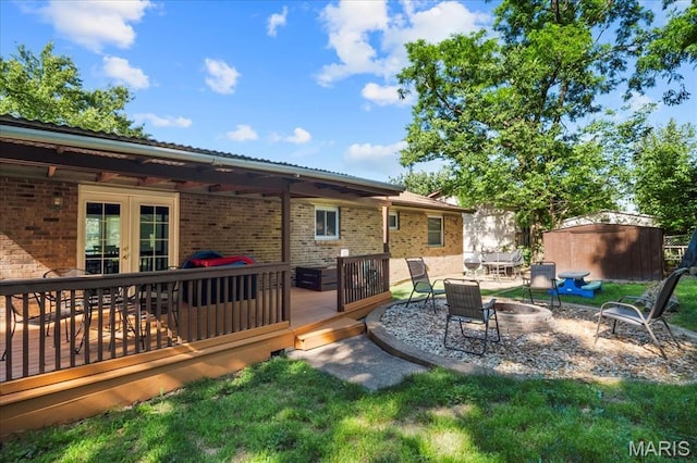 1748 Scenic Meadows Dr, Imperial, MO 63052 - view of yard featuring an outdoor fire pit, french doors, and a deck