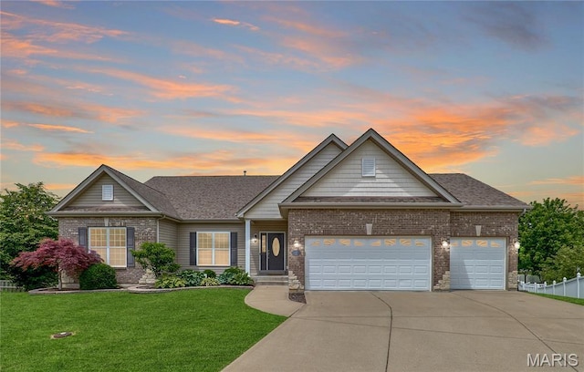 3 Lakeview Pointe Ct, Lake St Louis, MO 63367 - traditional-style home with brick siding, concrete driveway, a lawn, and an attached garage