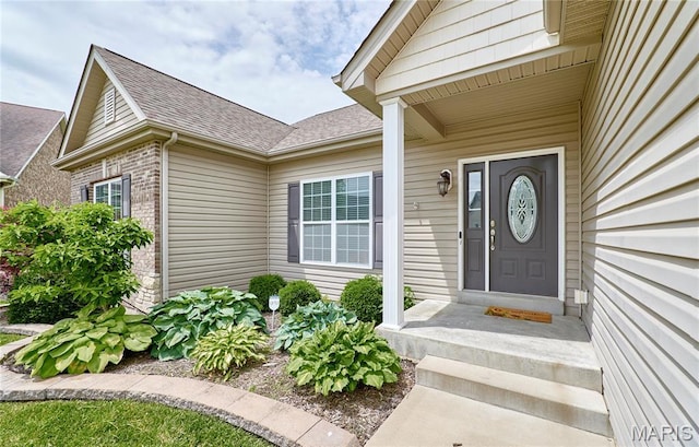 3 Lakeview Pointe Ct, Lake St Louis, MO 63367 - property entrance featuring a shingled roof