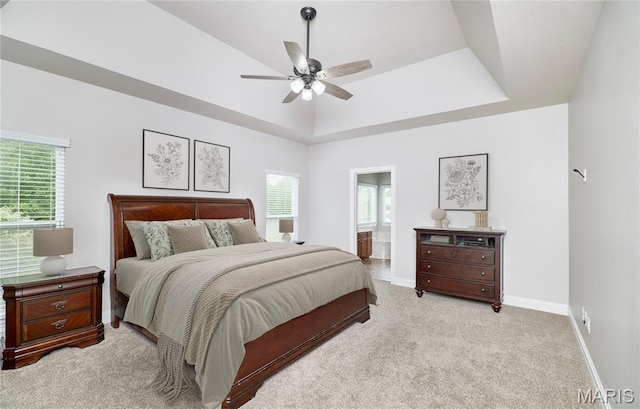 3 Lakeview Pointe Ct, Lake St Louis, MO 63367 - bedroom with carpet, multiple windows, baseboards, and a raised ceiling