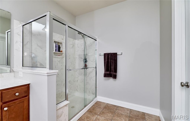 3 Lakeview Pointe Ct, Lake St Louis, MO 63367 - bathroom featuring a marble finish shower, vanity, and baseboards