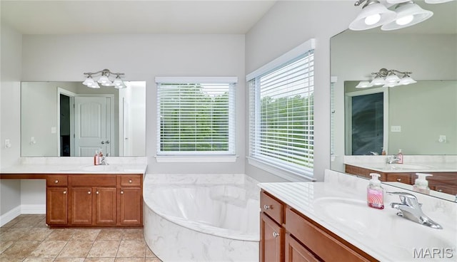 3 Lakeview Pointe Ct, Lake St Louis, MO 63367 - bathroom with a bath, two vanities, and tile patterned flooring