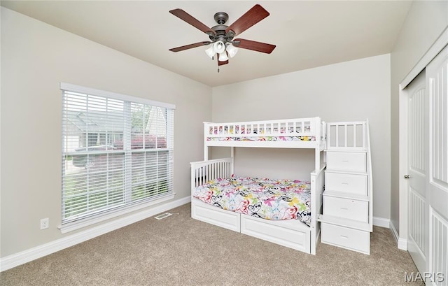 3 Lakeview Pointe Ct, Lake St Louis, MO 63367 - bedroom with light colored carpet, baseboards, and a ceiling fan