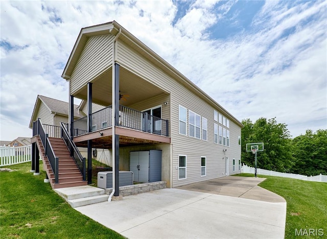 3 Lakeview Pointe Ct, Lake St Louis, MO 63367 - back of house featuring ceiling fan, stairs, and a deck