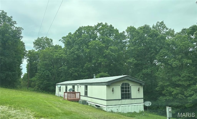 2557 River Bend Rd, Saint Clair, MO 63077 - view of side of home with a yard and a central air condition unit