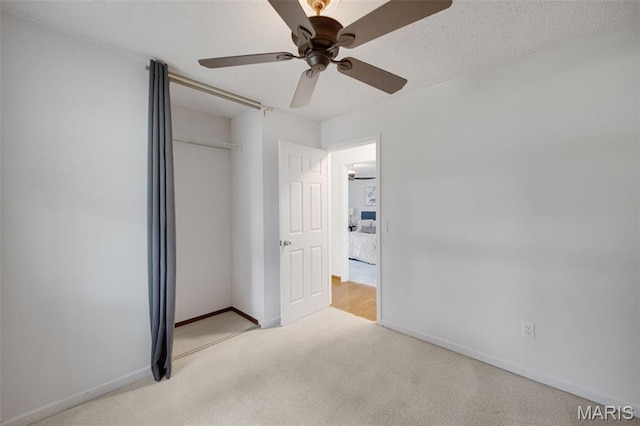 2794 Pinebrook Dr, Arnold, MO 63010 - unfurnished bedroom featuring carpet, baseboards, a closet, and ceiling fan