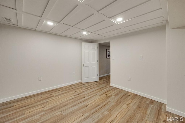 2794 Pinebrook Dr, Arnold, MO 63010 - finished below grade area with light wood-style flooring, recessed lighting, and baseboards