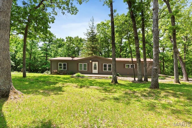 view of front of property with a front lawn