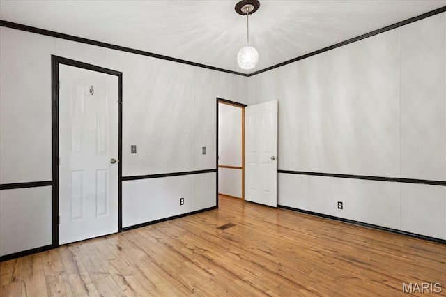 empty room featuring light wood finished floors