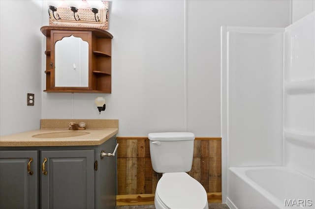 full bathroom featuring toilet and vanity
