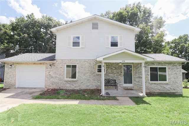 104 Wild Rose Pl, Saint Robert, MO 65584 - traditional home featuring an attached garage, covered porch, brick siding, a front yard, and driveway