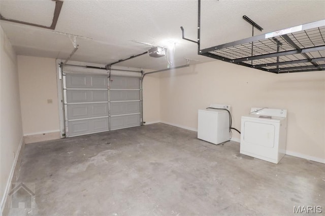 104 Wild Rose Pl, Saint Robert, MO 65584 - garage featuring washer / clothes dryer and a garage door opener