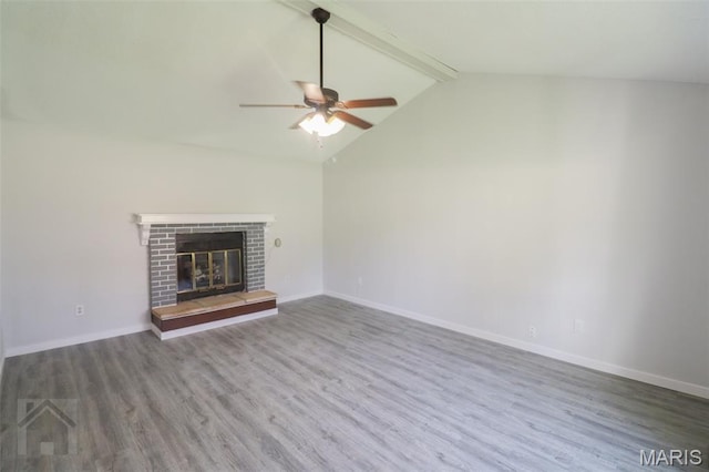 104 Wild Rose Pl, Saint Robert, MO 65584 - unfurnished living room featuring a ceiling fan, wood finished floors, and a fireplace