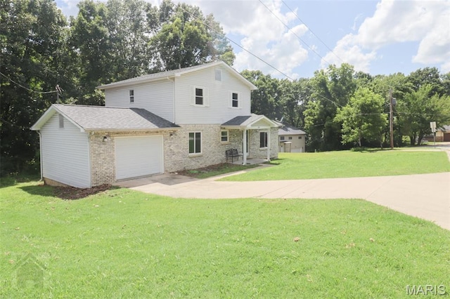 104 Wild Rose Pl, Saint Robert, MO 65584 - view of front of home with driveway, a front yard, a garage, and brick siding