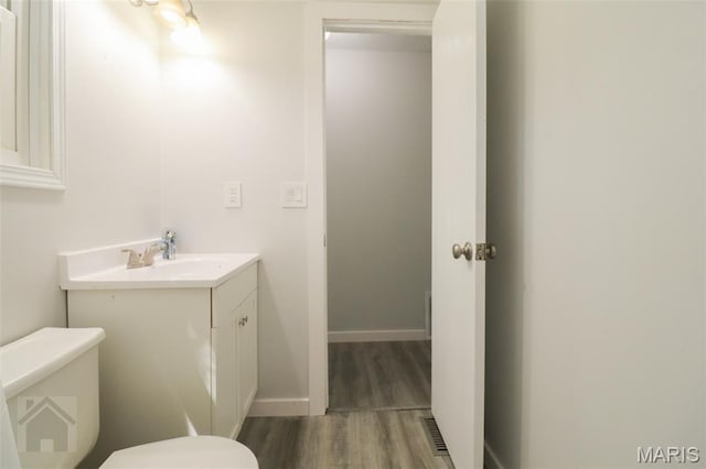 104 Wild Rose Pl, Saint Robert, MO 65584 - bathroom featuring vanity and wood finished floors