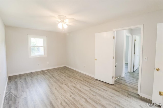 104 Wild Rose Pl, Saint Robert, MO 65584 - unfurnished room with ceiling fan and light wood-style flooring