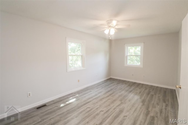 104 Wild Rose Pl, Saint Robert, MO 65584 - empty room with wood finished floors and a ceiling fan