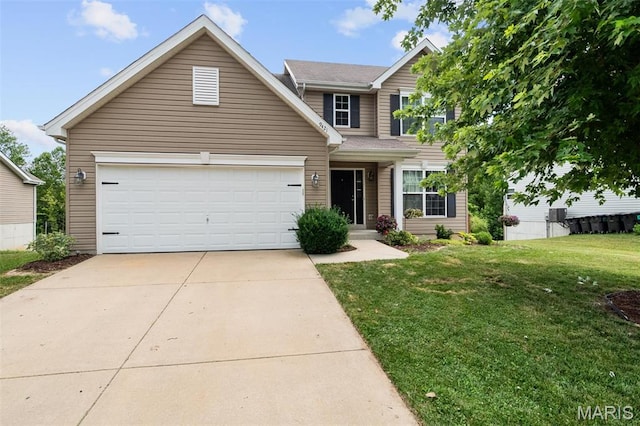 9421 Marbarry Dr, Fairview Heights, IL 62208 - traditional home with a front lawn, driveway, and a garage