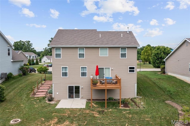 9421 Marbarry Dr, Fairview Heights, IL 62208 - back of property featuring a patio, a lawn, and a shingled roof