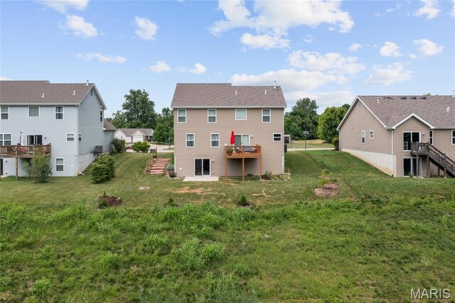 9421 Marbarry Dr, Fairview Heights, IL 62208 - back of property featuring stairway, a wooden deck, and a lawn