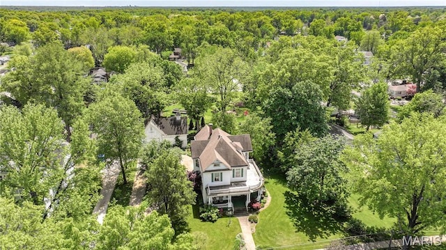 619 E Main St, Carlinville, IL 62626 - aerial view of a heavily wooded area