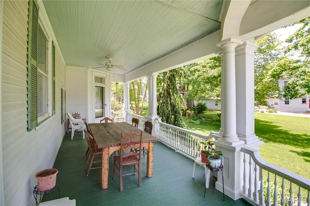 619 E Main St, Carlinville, IL 62626 - view of patio / terrace featuring covered porch, a ceiling fan, and outdoor dining space