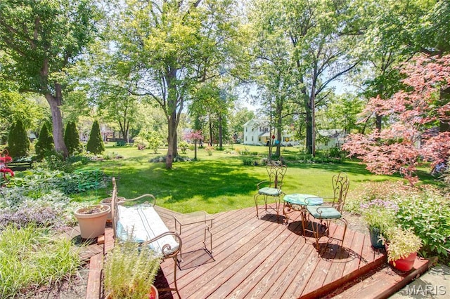 619 E Main St, Carlinville, IL 62626 - wooden deck with a lawn