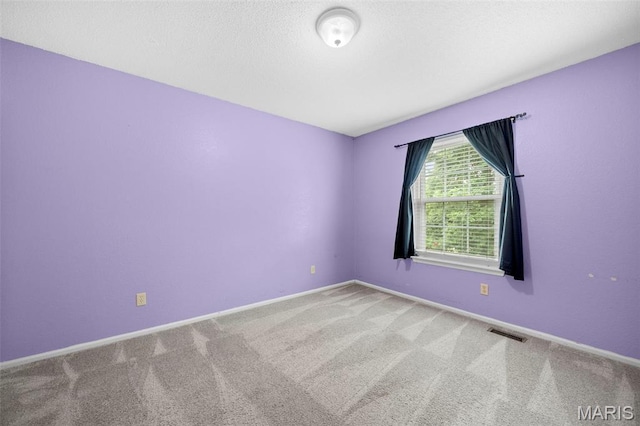 14 Sunderland Ct, Saint Charles, MO 63303 - spare room with carpet and baseboards