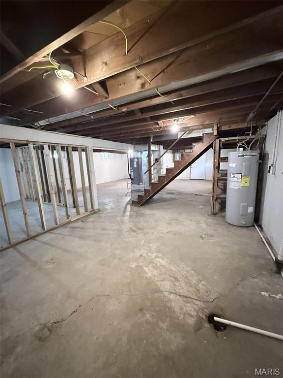 170 E Euclid Ave, Sullivan, MO 63080 - unfinished below grade area featuring water heater, stairway, and heating unit