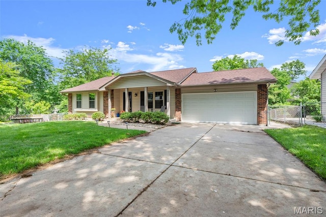 207 Straightoak, Ballwin, MO 63021 - single story home featuring an attached garage, driveway, brick siding, and a porch