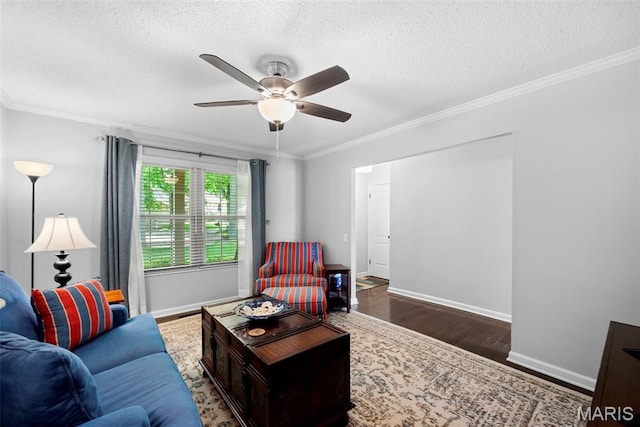 207 Straightoak, Ballwin, MO 63021 - living area featuring wood finished floors, a textured ceiling, a ceiling fan, crown molding, and baseboards