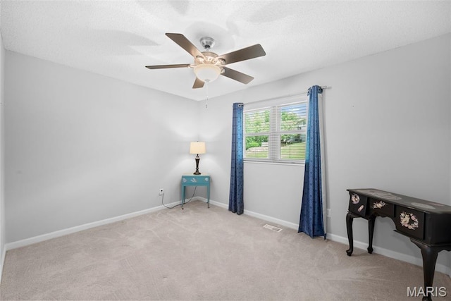 207 Straightoak, Ballwin, MO 63021 - carpeted spare room featuring ceiling fan, baseboards, and a textured ceiling