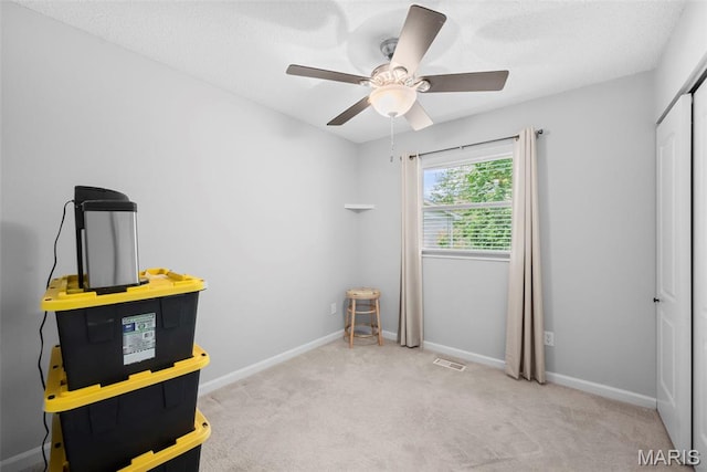 207 Straightoak, Ballwin, MO 63021 - bedroom featuring carpet, a closet, a ceiling fan, and baseboards