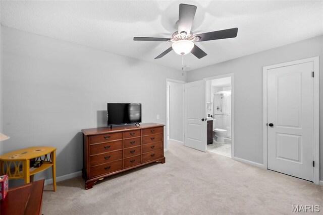 207 Straightoak, Ballwin, MO 63021 - bedroom with light carpet, baseboards, a ceiling fan, and ensuite bathroom