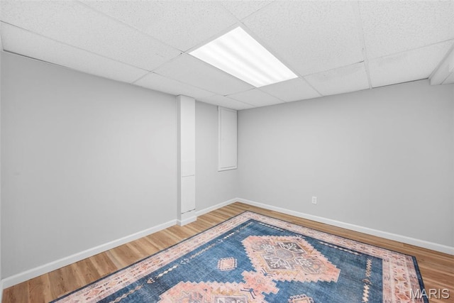207 Straightoak, Ballwin, MO 63021 - empty room featuring wood finished floors, baseboards, and a drop ceiling