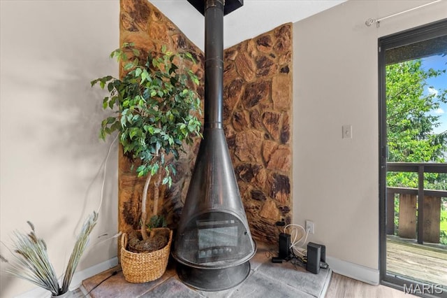 detailed view of baseboards and wood finished floors