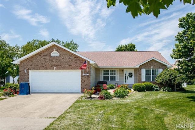 ranch-style home with brick siding, a garage, a front yard, and concrete driveway