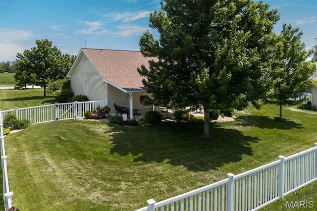 view of yard with a gate